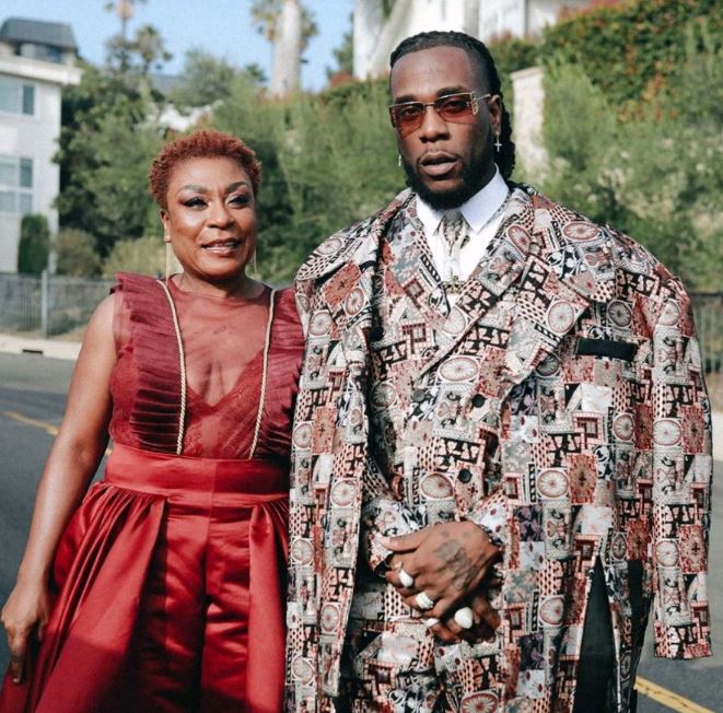 Burna Boy with his mother Bose. 

