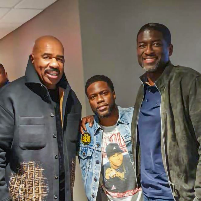 Kevin Okyere pictured with Hollywood superstars, Steven Harvey and Kevin Hart
