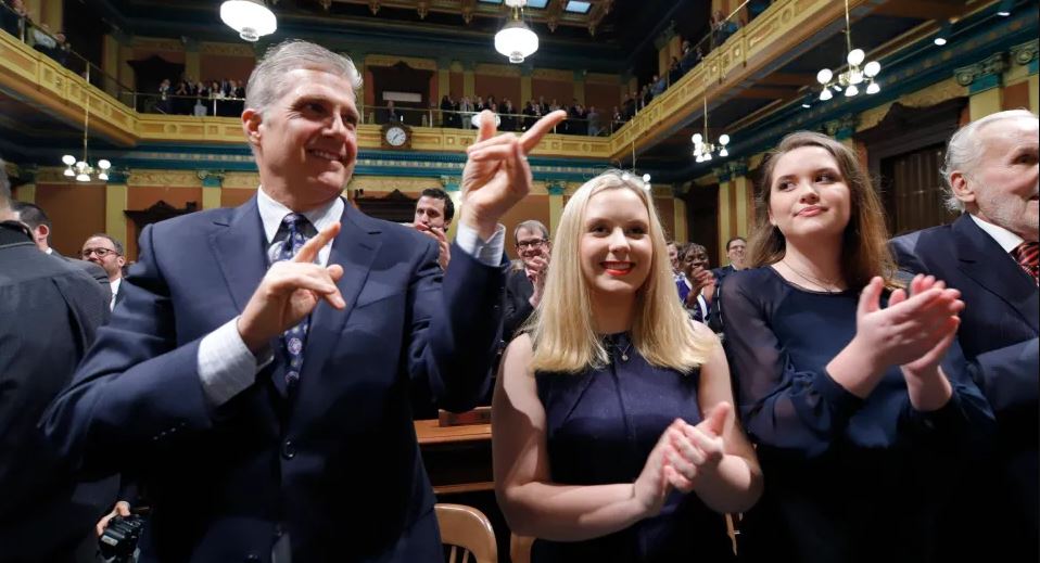 Family of Michigan Governor, Gretchen Whitmer, from left, husband Marc Mallory, and daughters Sydney Shrewsbury and Sherry Shrewsbury