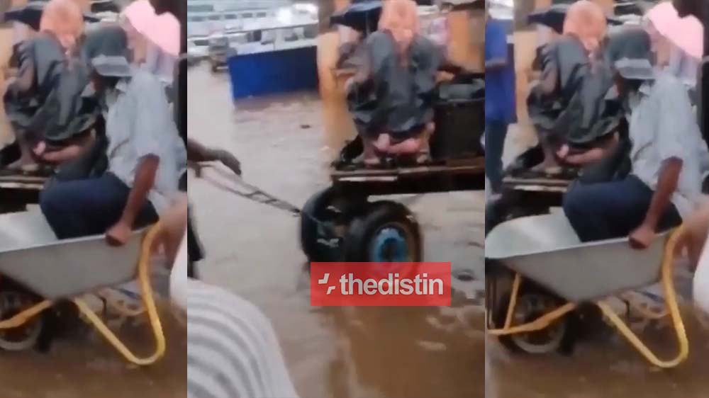 Video Of Ashaiman Residents Now Crossing Roads To Their Homes In Wheelbarrow After It Rained Heavily | Watch