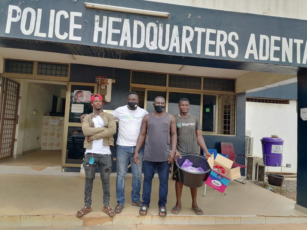 A police officer, Mr. Thomas Adongo organised a mini birthday party for himself, celebrates it was inmates in the Adenta Police Station cells.