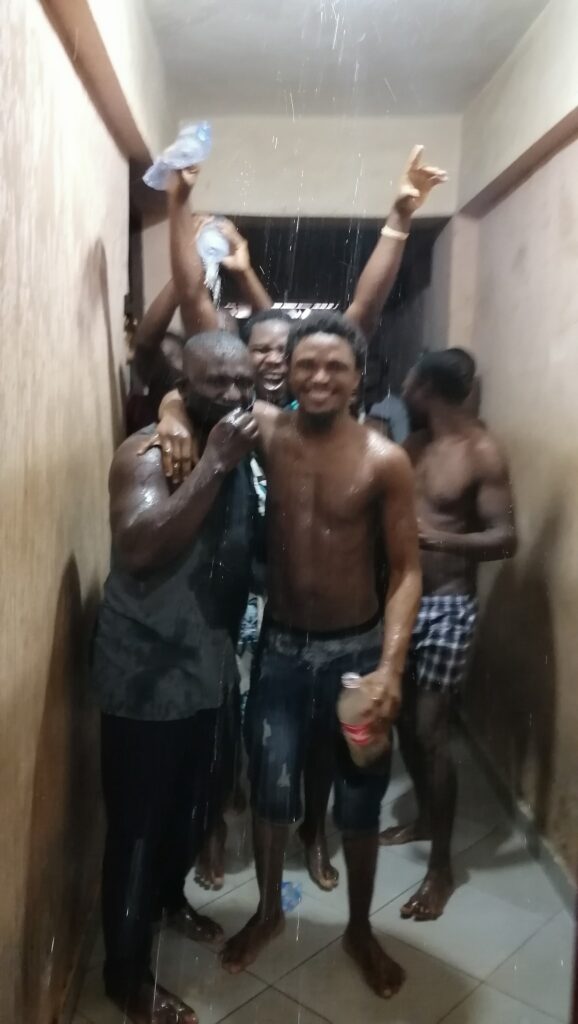 A police officer, Mr. Thomas Adongo organised a mini birthday party for himself, celebrates it was inmates in the Adenta Police Station cells.
