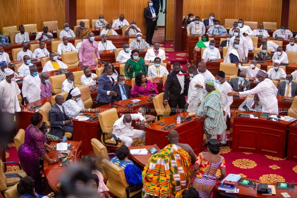 Pictures of MP for Ablekuma West, Ursula Owusu-Ekuful on the floor at the dissolution of the 7th parliament and the inauguration of the 8th Parliament of Ghana's 4th Republic as NDC and NPP MPs fight over majority side of parliament.