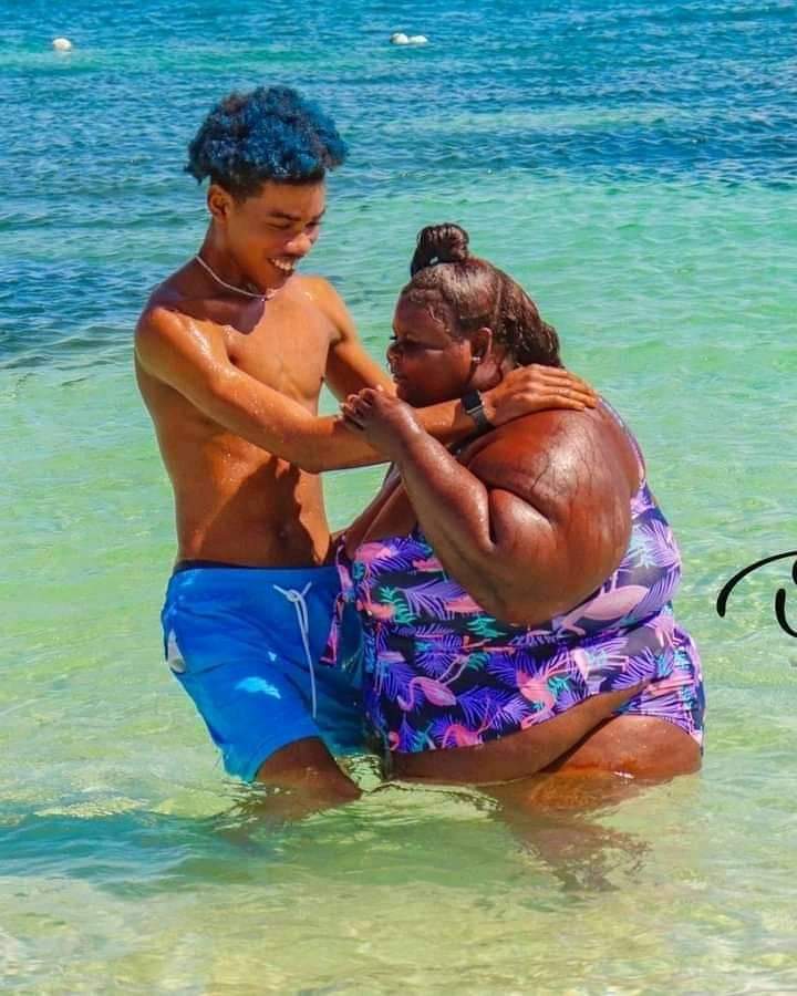 "I am in love with her heart not her body"- Young man shares a passionate moment with fat girlfriend (photos)