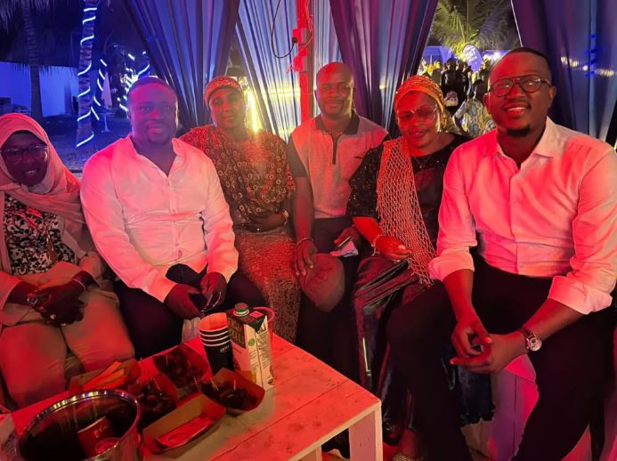 Black Sherif's parents and siblings seated with 3 Music CEO Baba Sadiq. 
