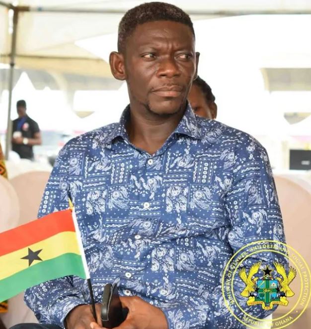 Agya Koo pictured with a Ghana flag at a function.
