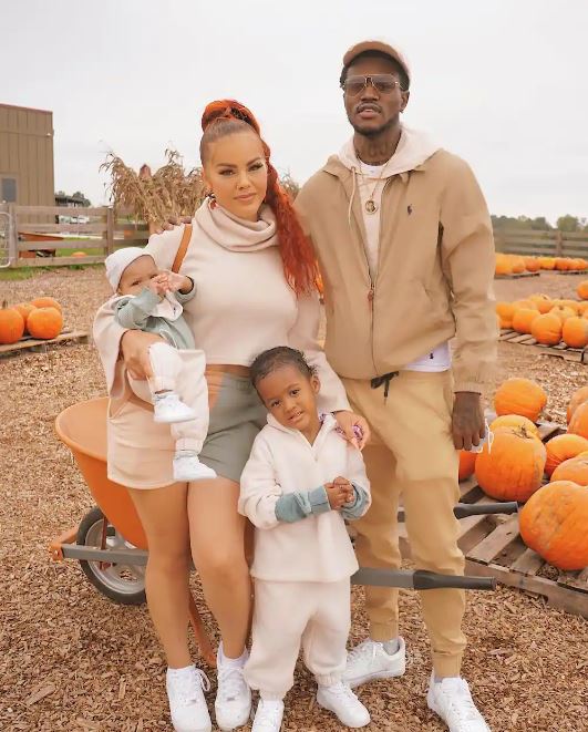 DC Young Fly with his longtime girlfriend and two of his kids. 
