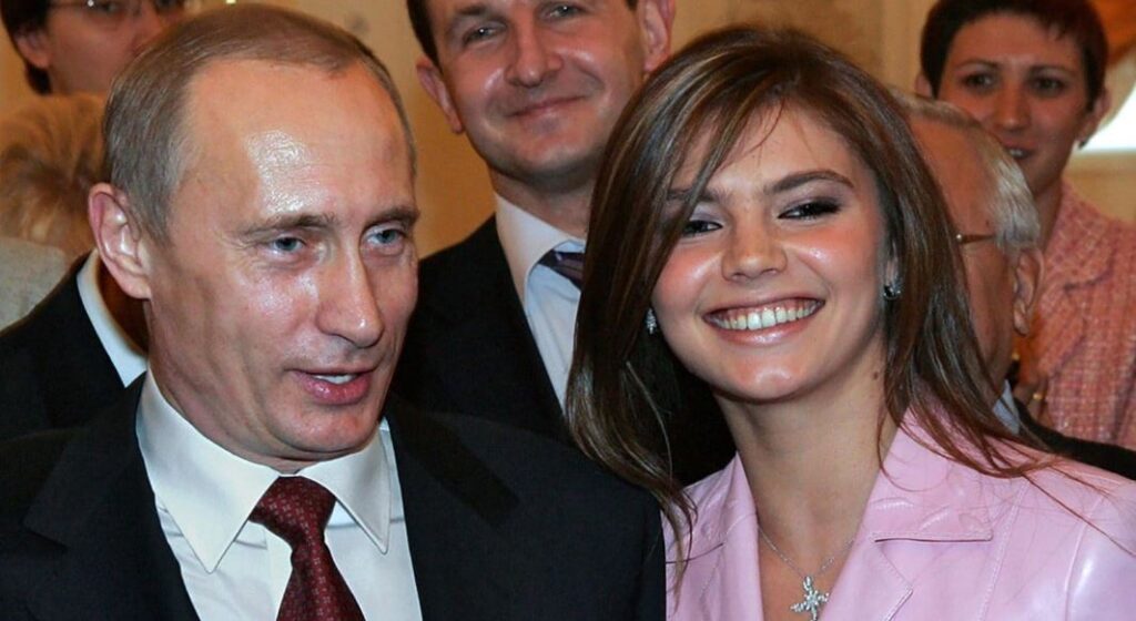 Alina Kabaeva and Vladimir Putin at an event in Kremlin CREDIT: Kremlin.ru

