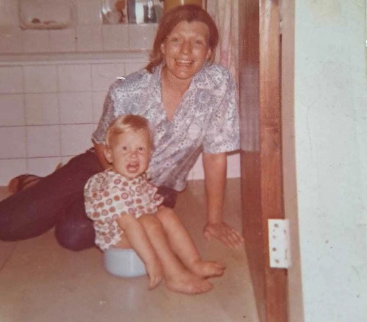 Elon Musk is seen on the potty as a toddler while his mom Maye beams with a smileCredit: Errol Musk