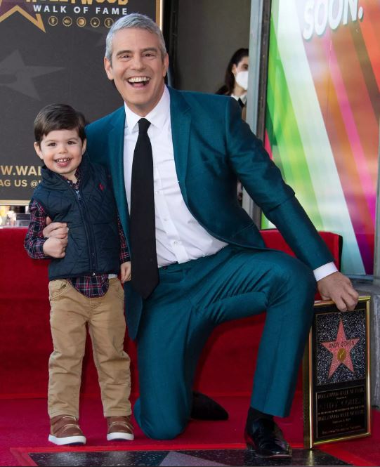 Andy Cohen poses with his son Benjamin during the ceremony to honor him with a Hollywood Walk of Fame star in Los Angeles, California, on February 4, 2022
