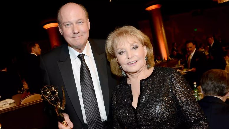 Television personality Barbara Walters and honoree Bill Geddie pose with the Lifetime Achievement Award onstage during The 39th Annual Daytime Emmy Awards