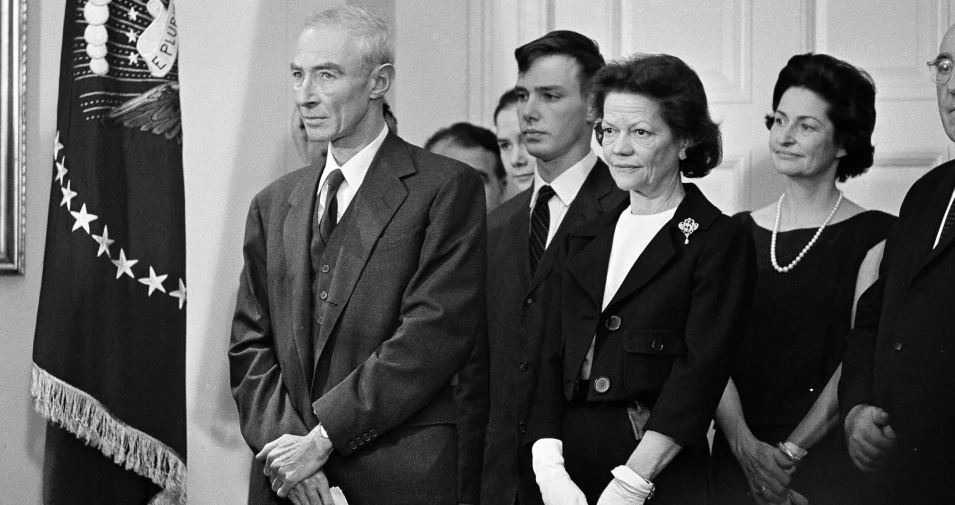 2Dr. J. Robert Oppenheimer (L), his son, Peter (C), and his wife, Katherine (R), in a ceremony at the White House when Oppenheimer was awarded the Enrico Fermi science award on December 2, 1963Credit: AP:Associated Press