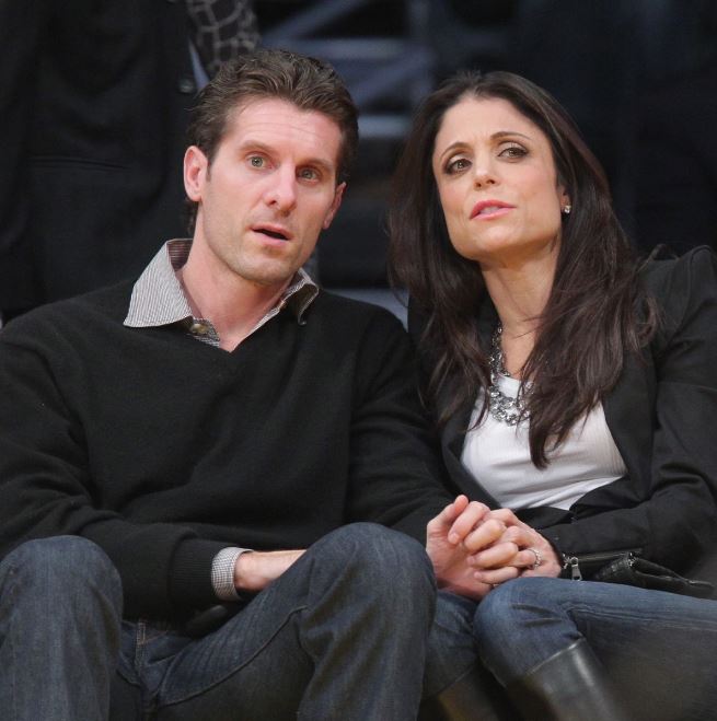 Bethenny Frankel sitting with her second husband, Jason Hoppy. They were married for two years; from 2010 to 2012 and finalised their divorce in 2021. Image Source: Getty