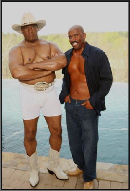 Steve Harvey pictured with his bodyguard, Big Boom
