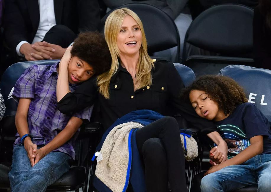 Henry Samuel, Heidi Klum and Johan Samuel attend a basketball game between the New Orleans Pelicans and the Los Angeles Lakers at Staples Center on April 1, 2015 in Los Angeles, California