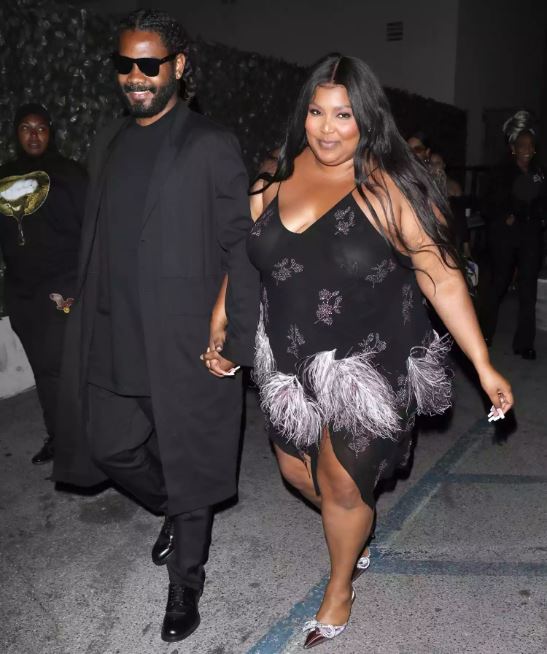 Myke Wright and his girlfriend singer Lizzo stepping out in styles. 
