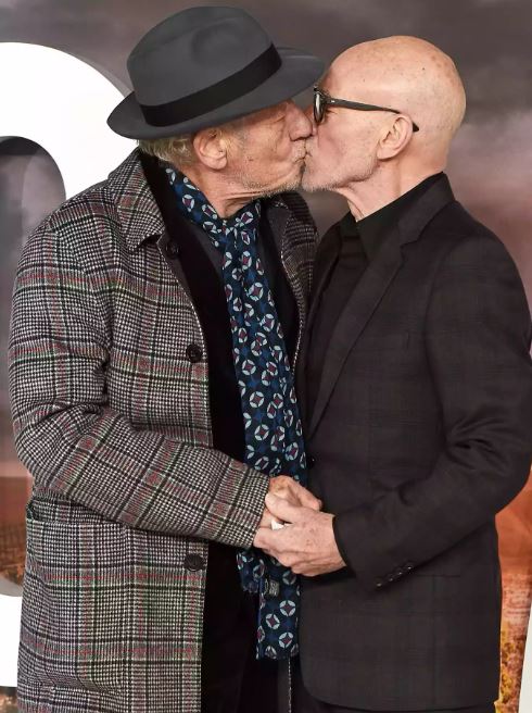 Ian McKellen and Sir Patrick Stewart kiss on the red carpet during the "Star Trek Picard" UK Premiere at Odeon Luxe Leicester Square on January 15, 2020 in London, England