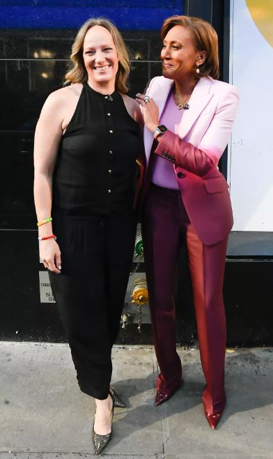 Amber Laign and Robin Roberts celebrate Robin Roberts' 20th "GMA" anniversary outside "Good Morning America" on April 14, 2022 in New York City. RAYMOND HALL/GC IMAGES
