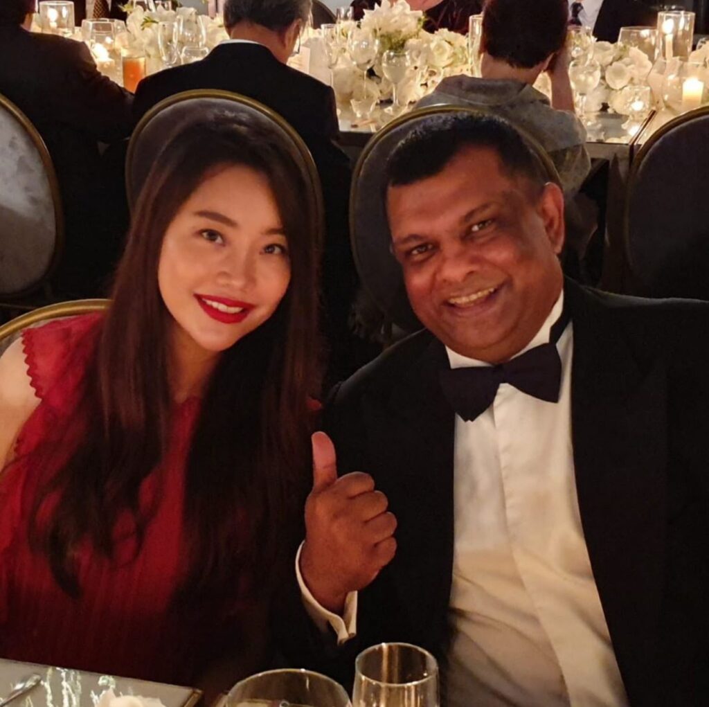 CEO of AirAsia Tony Fernandes at an event with his spouse, Chloe Kim