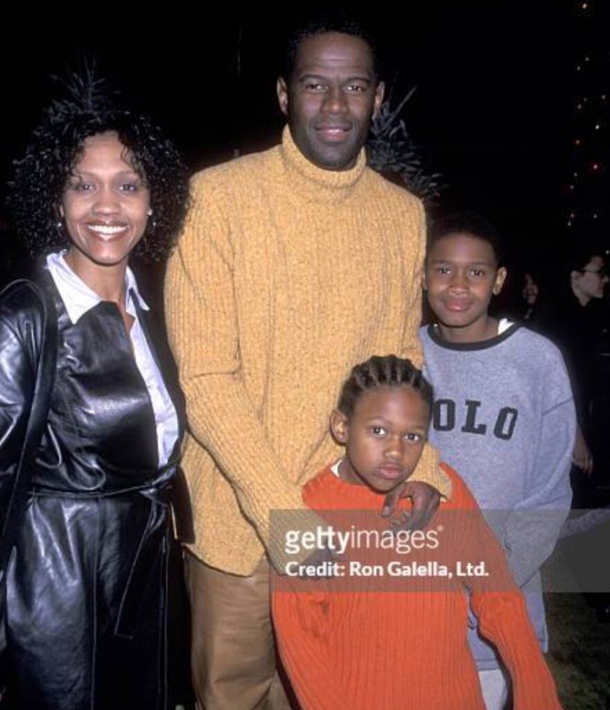 Brian with his ex-spouse, Julie, and their two sons. Image Source: Getty