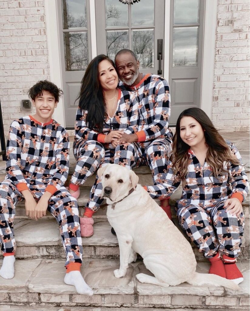 Brian McKnight pictured with his wife, Mendoza, and her biological kids. Image Source: Instagram