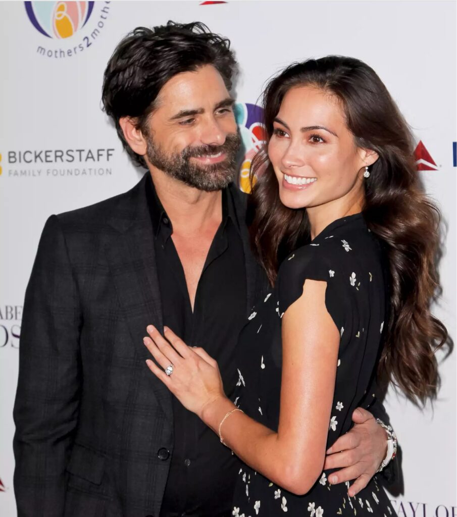 John Stamos and Caitlin McHugh attend the mothers2mothers and The Elizabeth Taylor AIDS Foundation Benefit Dinner on October 24, 2017 in Beverly Hills, California