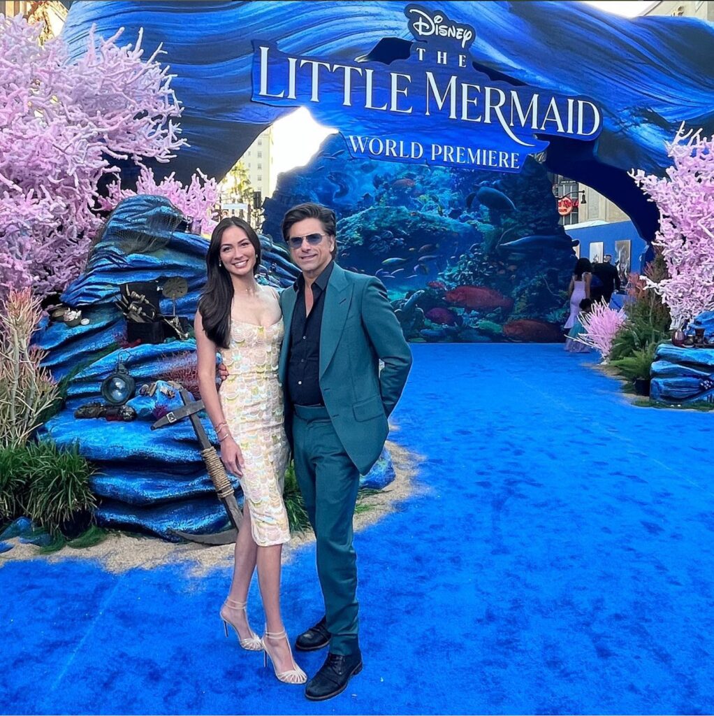 John Stamos and Caitlin McHugh at the world premiere of Disney's The Little Mermaid. Image Source: Instagram