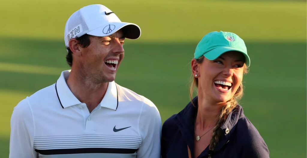 Rory McIlroy of Northern Ireland celebrates with his girlfriend Erica Stoll after winning the the DP World Tour Golf Championship in Dubai. Image Source: KARIM SAHIB/AFP VIA GETTY