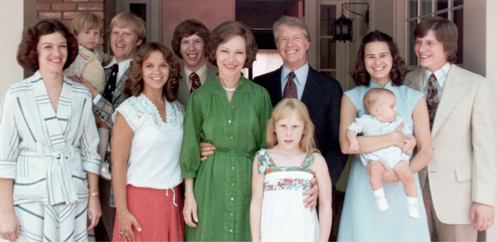 A portrait of President Jimmy Carter and his extended family. Left to right: Judy (Mrs. Jack Carter); Jason James Carter; Jack (John William Carter); Annette (Mrs. Jeff Carter); Jeff (Donnel Jeffrey Carter); First Lady Rosalynn Carter; daughter Amy Lynn Carter; President Carter; daughter-in law Caron Griffin Carter holding James Earl Carter IV; and son Chip (James Earl Carter III).
Corbis via Getty Images