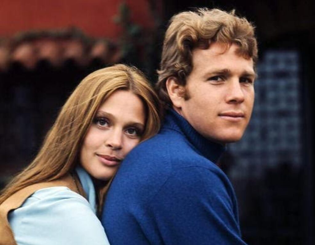 Leigh Taylor-Young, here with then-husband, Ryan O'Neal in 1968. Image Source: Facebook